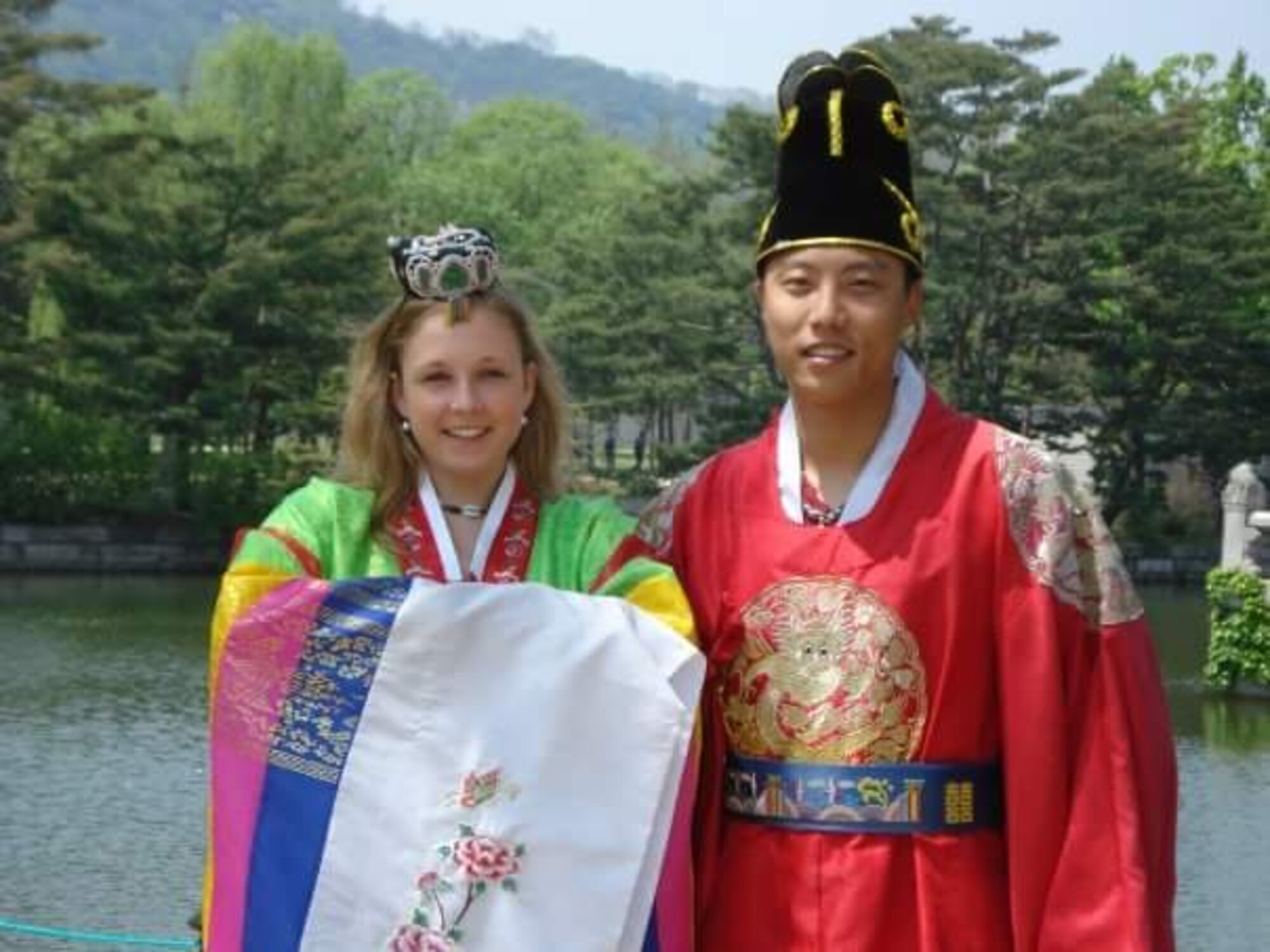Second Lt. Nadine Suh, 22nd Medical Support Squadron TRICARE Operations and Patient Administration flight commander, and Tech. Sgt. Young Suh, 22nd Contracting Squadron plans and programs section chief, pose in traditional Korean garments in 2007. Nadine grew up in a small town in Germany before meeting and eventually marrying Young, who was born in South Korea, while he was stationed in Germany for his first assignment after enlisting in the Air Force. (Courtesy photo)