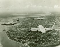 JOINT BASE CHARLESTON, SC -- C-130s from the Charleston Air Force Base fly over the
Charleston peninsula in the early 1960’s. Only a few years later, they were replaced by the C-141. The next year, on January 8, 1966, the 437th Military Airlift Wing took over as
Charleston AFB’s host unit. When placed under the newly formed Air Mobility Command in 1992, the unit became the 437th Airlift Wing. A year later, on July 14, 1993, the first C-17
was delivered to the 437th AW. (Courtesy Photo)