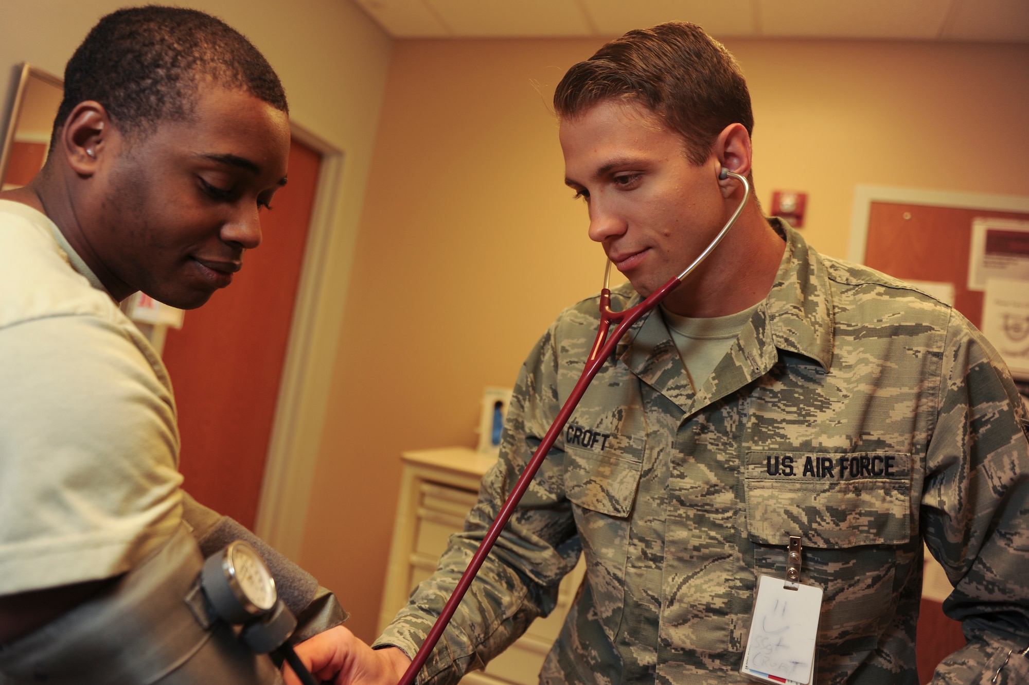 Staff Sgt. Jacob Croft, a 19th Medical Operations Squadron aerospace medical technician, checks a patient’s vitals Dec. 29, 2015, at Little Rock Air Force Base, Ark. Croft recently completed his Community College of the Air Force degree and was competitively selected to attend paramedic school starting in January 2016. (U.S. Air Force photo by Senior Airman Scott Poe)