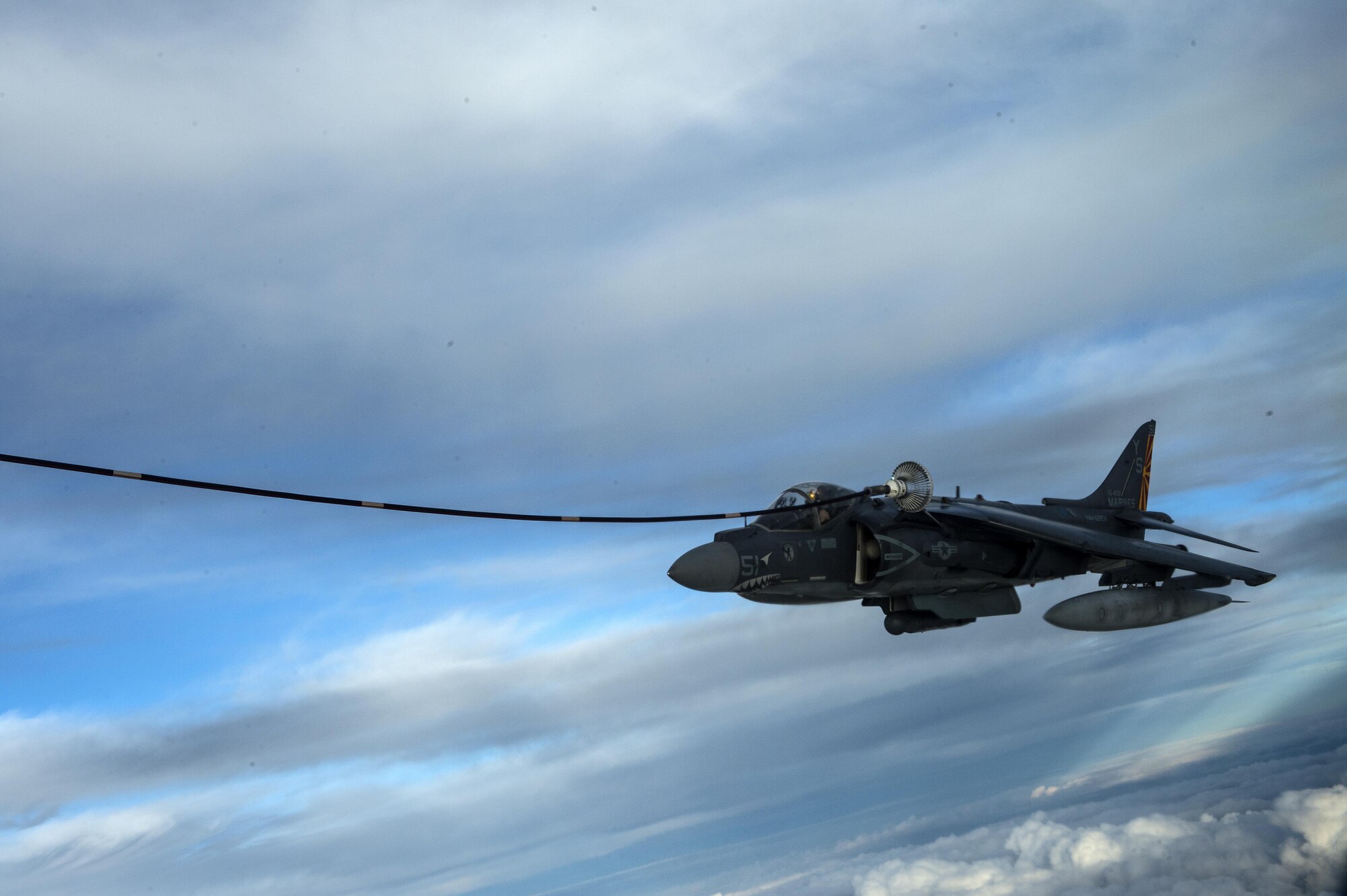 A U.S. Marine Corps AV-8B Harrier II refuels over Iraq in support of Operation Inherent Resolve, Dec. 31, 2015. OIR is the coalition intervention against the Islamic State of Iraq and the Levant. (U.S. Air Force photo by Tech. Sgt. Nathan Lipscomb)