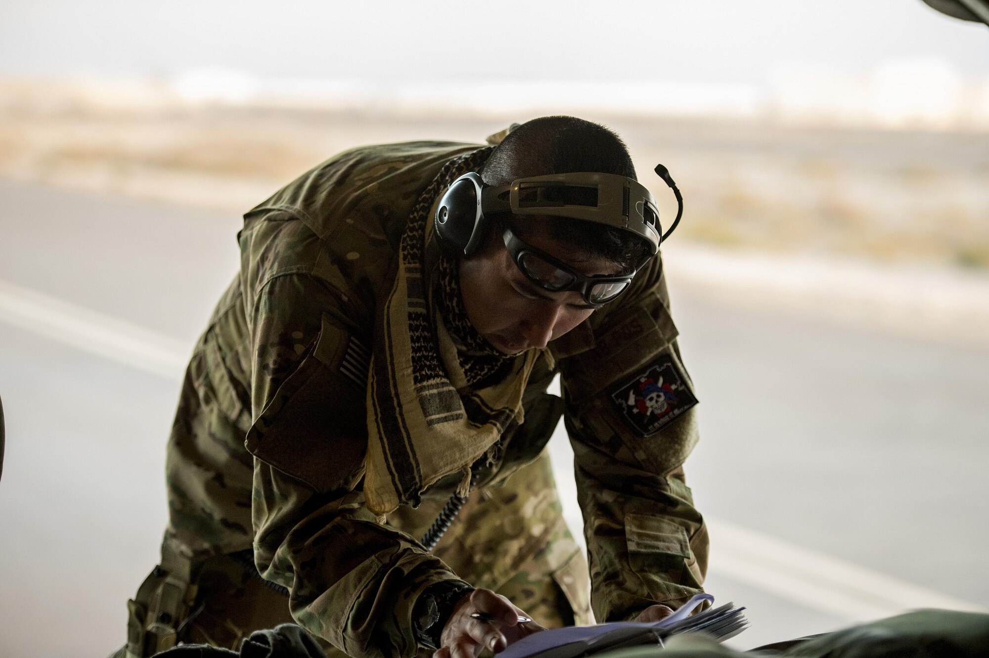 U.S. Air Force Staff Sgt. Joshua Ritter, 379th Expeditionary Aeromedical Evacuation Squadron medical technician, takes inventory of an injured Airman's bags in support of Operation Inherent Resolve at an undisclosed location in Southwest Asia, Jan. 6, 2016. OIR is the coalition intervention against the Islamic State of Iraq and the Levant. (U.S. Air Force photo by Tech. Sgt. Nathan Lipscomb)