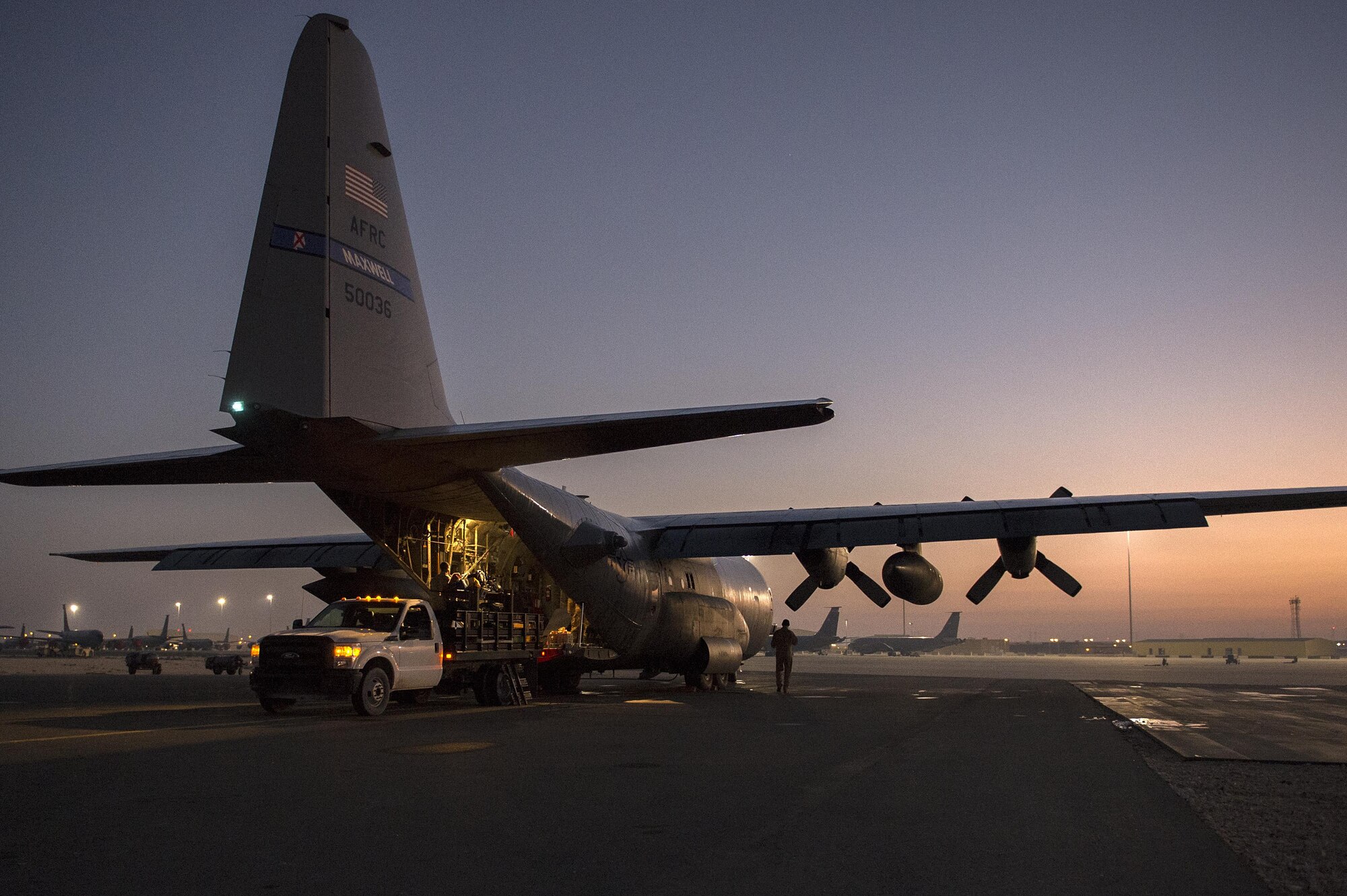 U.S. Air Force Airmen from the 379th Expeditionary Aeromedical Evacuation Squadron load medical equipment onto a C-130H Hercules at Al Udeid Air Base, Qatar in support of Operation Inherent Resolve, Jan. 6, 2016. OIR is the coalition intervention against the Islamic State of Iraq and the Levant. (U.S. Air Force photo by Tech. Sgt. Nathan Lipscomb)