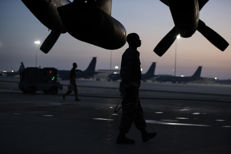 U.S. Air Force Staff Sgt. Charles Raby, 746th Expeditionary Aircraft Maintenance Squadron crew chief, inspects a C-130H Hercules at Al Udeid Air Base, Qatar in support of Operation Inherent Resolve, Jan. 6, 2016. OIR is the coalition intervention against the Islamic State of Iraq and the Levant. (U.S. Air Force photo by Tech. Sgt. Nathan Lipscomb)