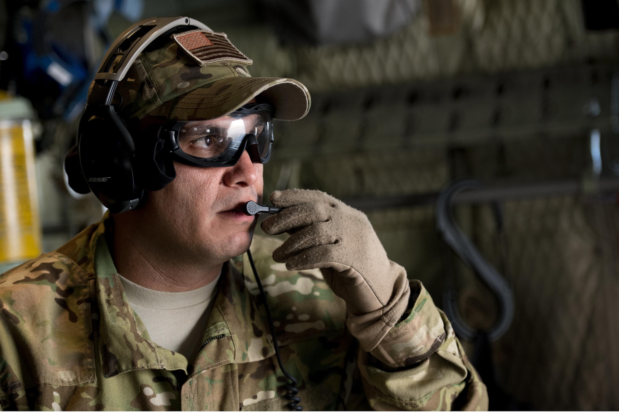 U.S. Air Force Capt. Jose Martinez, 379th Expeditionary Aeromedical Evacuation Squadron nurse, talks to team members as they bring in an  injured Airman at an undisclosed location in Southwest Asia in support of Operation Inherent Resolve, Jan. 6, 2016. OIR is the coalition intervention against the Islamic State of Iraq and the Levant. (U.S. Air Force photo by Tech. Sgt. Nathan Lipscomb)