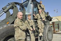 (From left to right) Tech. Sgt. Chad Huggins, Staff Sgt. Tobi Wagner, Master Sgt. Matthew Longshaw and Airman 1st Class John MIchael Aradanas, 455th Expeditionary Logistics Readiness Squadron, were at Hamid Karzai International Airport in Kabul when a vehicle-borne improvised explosive device detonated. The team stepped in to lend a hand in caring for the wounded. (U.S. Air Force photo by Capt. Bryan Bouchard)