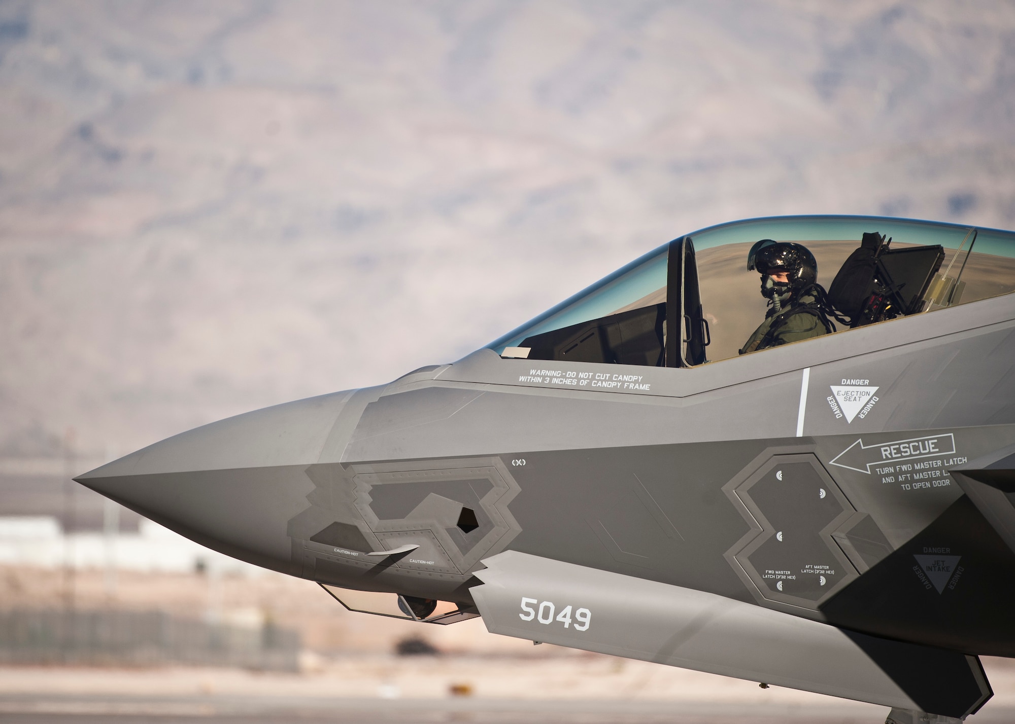Capt. Brent Golden taxies an F-35A Lightning II at Nellis Air Force Base, Nev., Jan. 15, 2015. The F-35 that Golden, a 16th Weapons Squadron instructor, flew is the U.S. Air Force Weapons School’s first assigned F-35. (U.S. Air Force photo/Staff Sgt. Siuta B. Ika) 