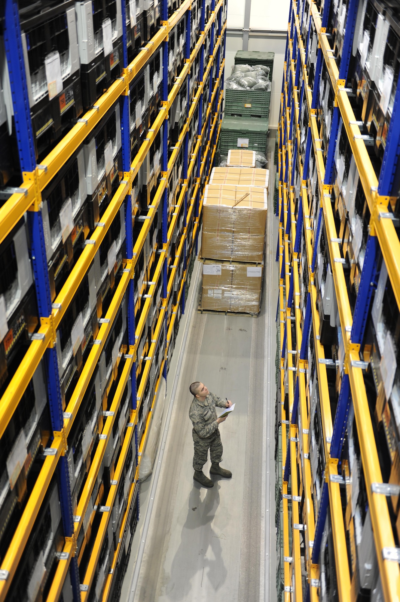 Airman 1st Class Alexander Hershberger takes inventory of storage bins Jan. 28, 2015, on Ramstein Air Base, Germany. During an average week, the 86th Logistics Readiness Squadron’s individual protective equipment team processes about 130 to 150 service member’s individual protective gear, ranging from bases all over U.S. Air Forces in Europe and Air Forces Africa. Hershberger is an IPE assigned to the 86th LRS. (U.S. Air Force photo/Airman 1st Class Michael Stuart)