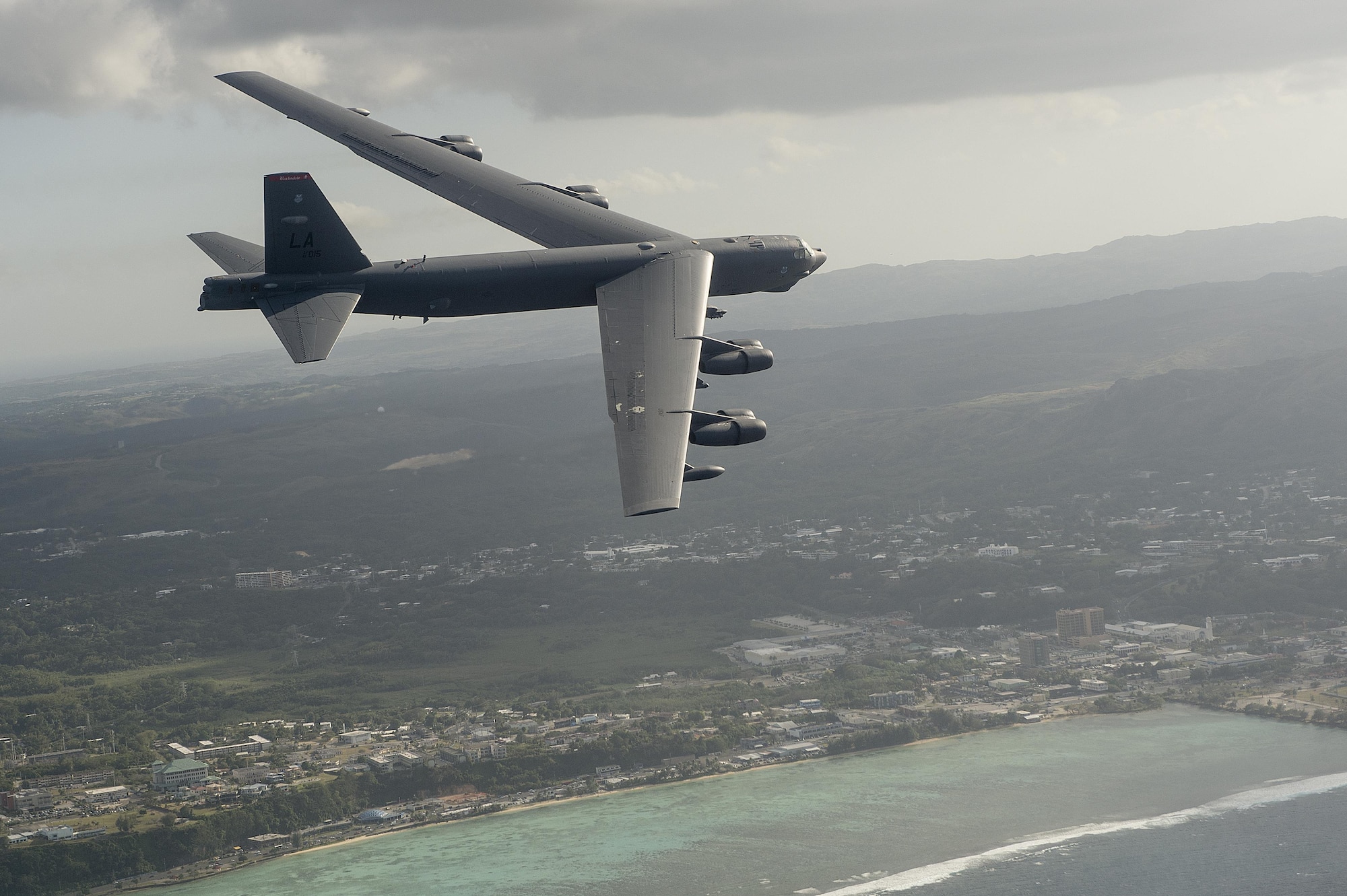 A B-52H Stratofortress flies during exercise Cope North 15, Feb. 17, 2015, off the coast of Guam. During the exercise, the U.S., Japan and Australia air forces worked on developing combat capabilities enhancing air superiority, electronic warfare, air interdiction, tactical airlift and aerial refueling. The B-52H is assigned to the 96th Expeditionary Bomb Squadron. (U.S. Air Force photo/Tech. Sgt. Jason Robertson)                                           