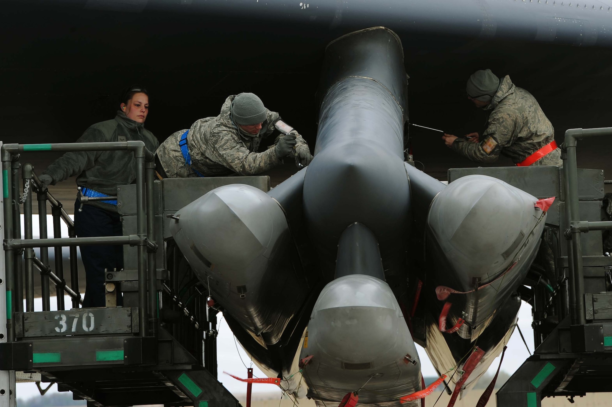 Airmen from the 2nd Aircraft Maintenance Squadron load weapons onto a B-52H Stratofortress during an exercise on Minot Air Force Base, N.D., May 7, 2015. The exercise provided training opportunities for forces to deter and, if necessary, defeat a military attack against the U.S. (U.S. Air Force photo/Senior Airman Kristoffer Kaubisch)