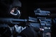 A security forces Airman secures the outside of a hardened facility after neutralizing the opposing force during a combat training course on Ramstein Air Base, Germany, May 30, 2015. The Battlefield Leaders Assaulter Course, Integrated Combat Essentials is designed to teach security forces members from multiple countries advanced tactics and shooting skills for use in the event of a base security breach. (U.S. Air Force photo/Tech. Sgt. Ryan Crane)