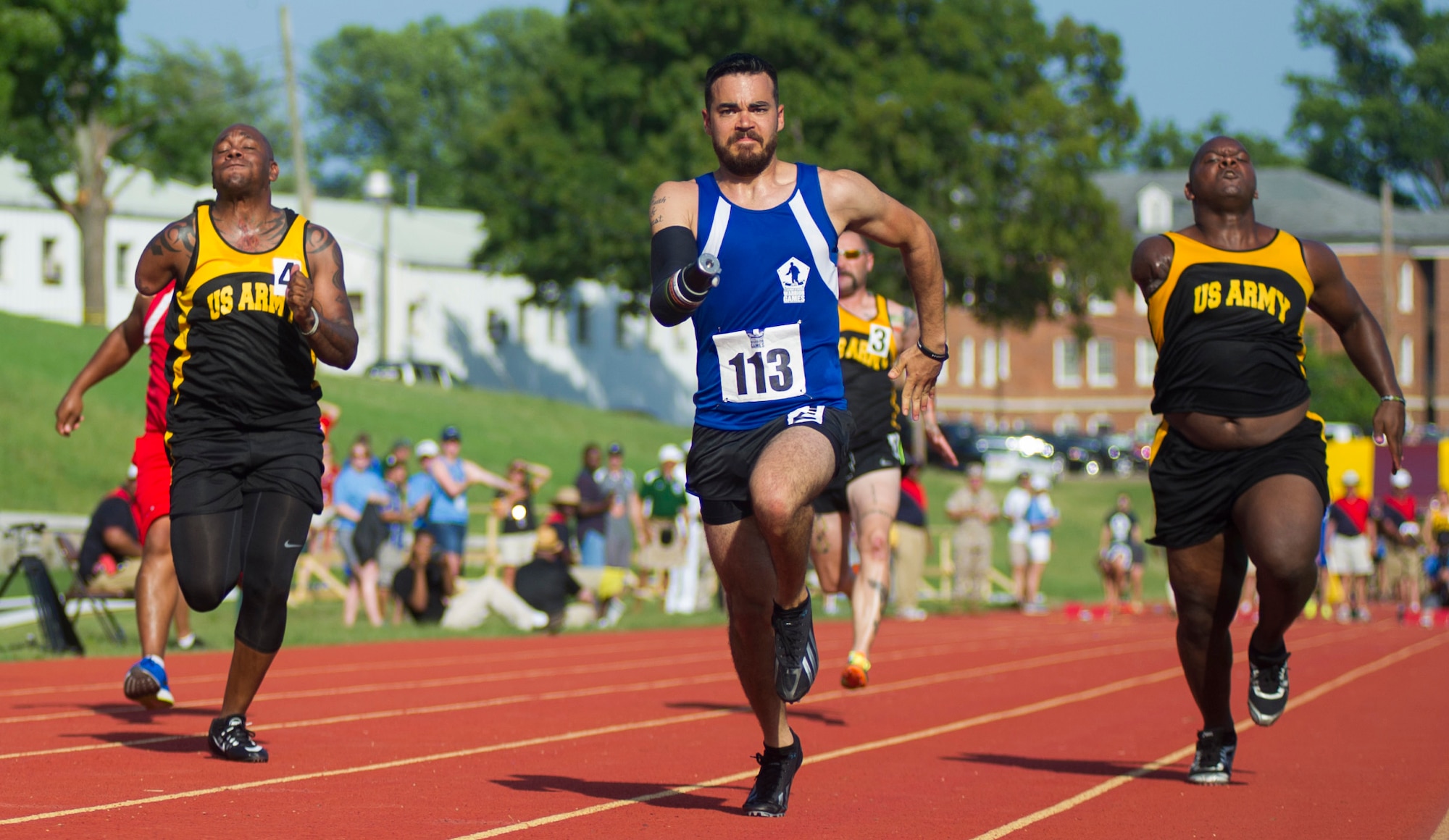 Retired Staff Sgt. Daniel Crane participates in the 100-meter sprint during the 2015 Department of Defense Warrior Games at the National Museum of the Marine Corps in Quantico, Va., June 23, 2015. The Warrior Games featured athletes from throughout the DOD who compete in Paralympic-style events for their respective military branches. (U.S. Marine Corps photo/Lance Cpl. Terry W. Miller Jr.)