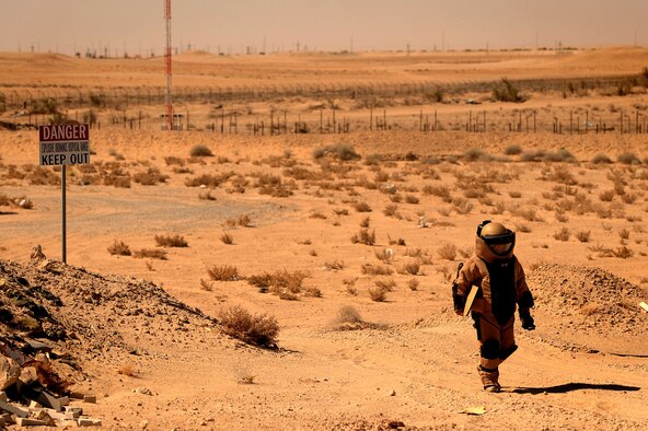 Tech. Sgt. Matthew Bingaman, a 386th Expeditionary Civil Engineer Squadron explosive ordnance disposal technician, returns from a manual approach to an improvised explosive device training scenario June 25, 2015, in Southwest Asia. Even as a 16-year EOD veteran, Bingaman continually trains to safely handle live explosives. (U.S. Air Force photo/Tech. Sgt. Brittany E. Jones)