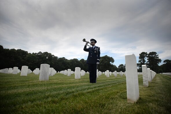 Senior Airman Michael C. Dancona and Senior Airman Dominic Surinaga, both members of the 106th Rescue Wing Honor Guard, conduct services at Calverton National Cemetery July 22, 2015. As part of their daily work, the 106th Honor Guard performs funeral services at military burial grounds throughout New York.
(New York Air National Guard photo/Staff Sergeant Christopher S. Muncy)
