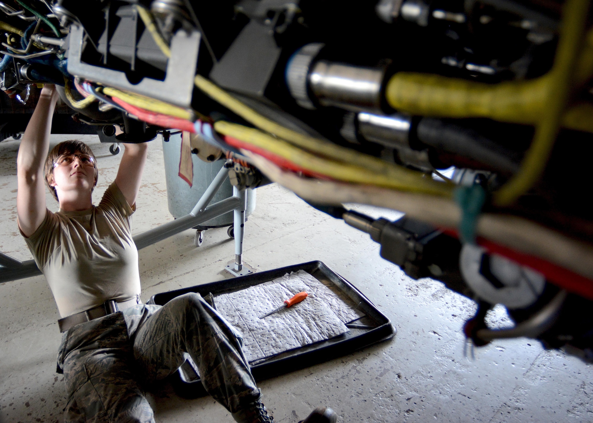 A Florida Air National Guard Airman from an aerospace propulsions flight installs a stator generator on an F100 Pratt and Whitney 200E jet engine Sept. 3, 2015, at the 125th Fighter Wing in Jacksonville, Fla. (U.S. Air Force photo/Tech. Sgt. Troy Anderson)