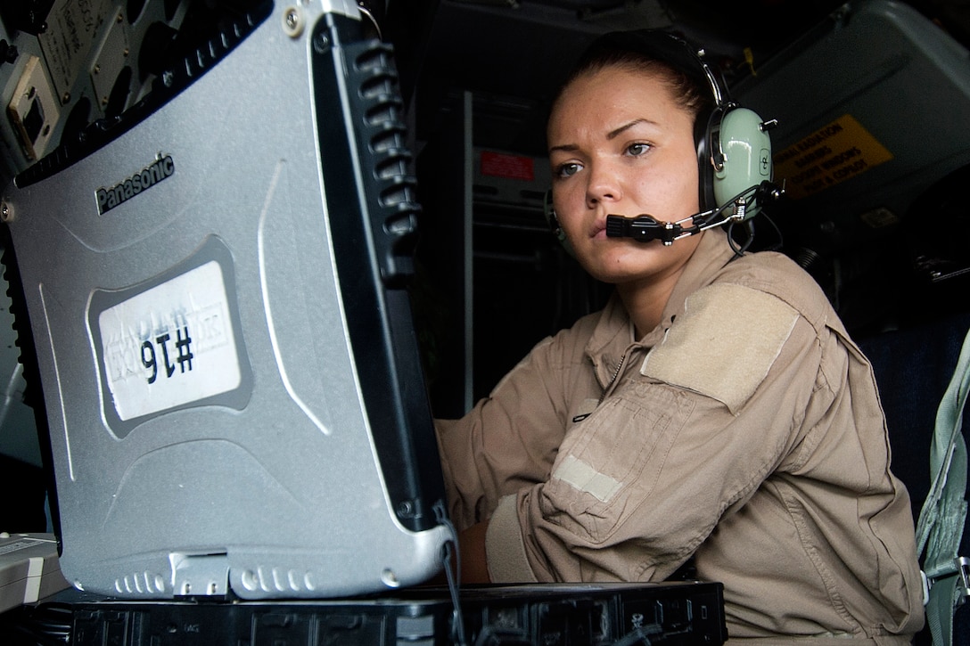 U.S. Air Force Airman 1st Class Shelby Bowling performs preflight checks on Al Udeid Air Base, Qatar, Dec. 31, 2015, to support Operation Inherent Resolve. Bowling is a boom operator assigned to the 340th Expeditionary Air Refueling Squadron. The squadron reached a significant milestone in 2015 by flying more than 100,000 combat hours. U.S. Air Force photo by Tech. Sgt. Nathan Lipscomb