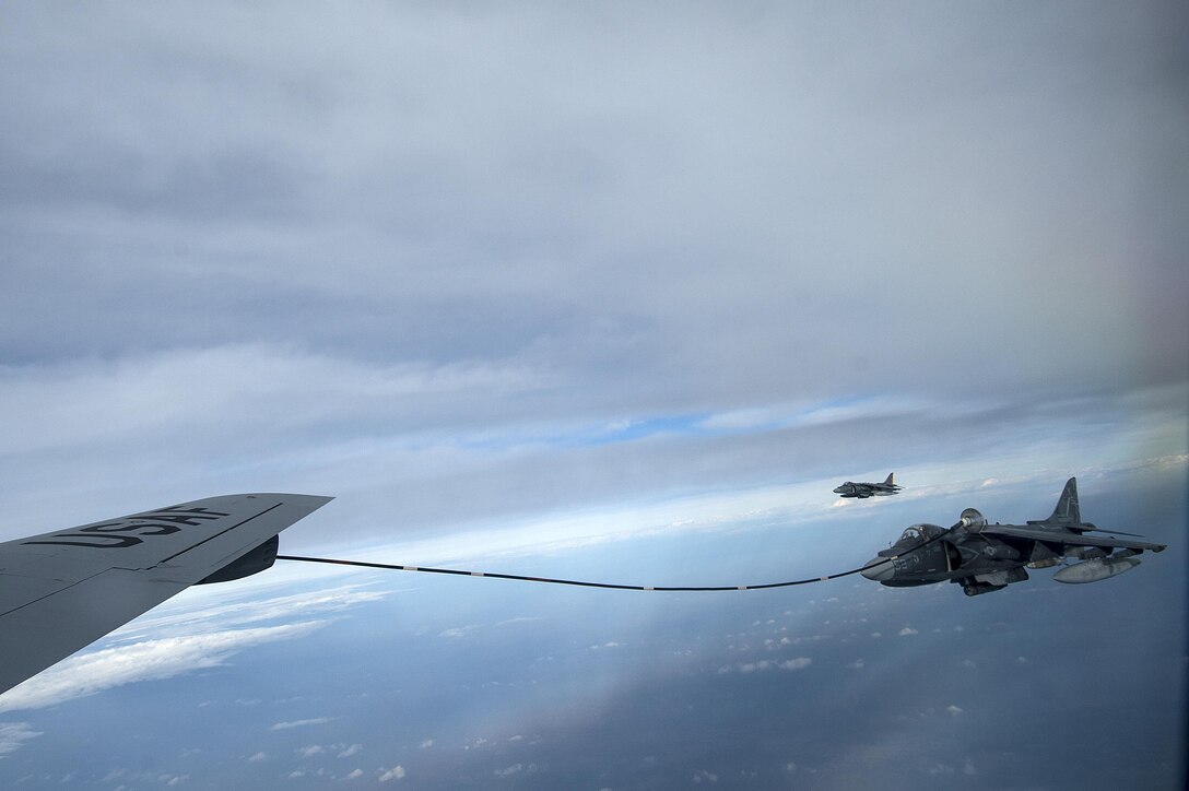 A U.S. Air Force KC-135 Stratotanker refuels a U.S. Marine Corps AV-8B Harrier II aircraft over Iraq to support Operation Inherent Resolve, Dec. 31, 2015. U.S. Air Force photo by Tech. Sgt. Nathan Lipscomb