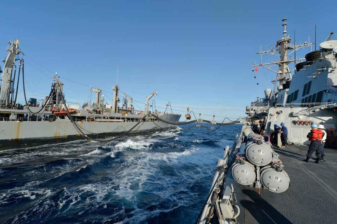 U.S. sailors aboard the USS Ross conduct a replenishment at sea with the Military Sealift Command fleet replenishment oiler USNS Leroy Grumman in the Mediterranean Sea Jan. 5, 2016. U.S. Navy photo by Petty Officer 2nd Class Justin Stumberg