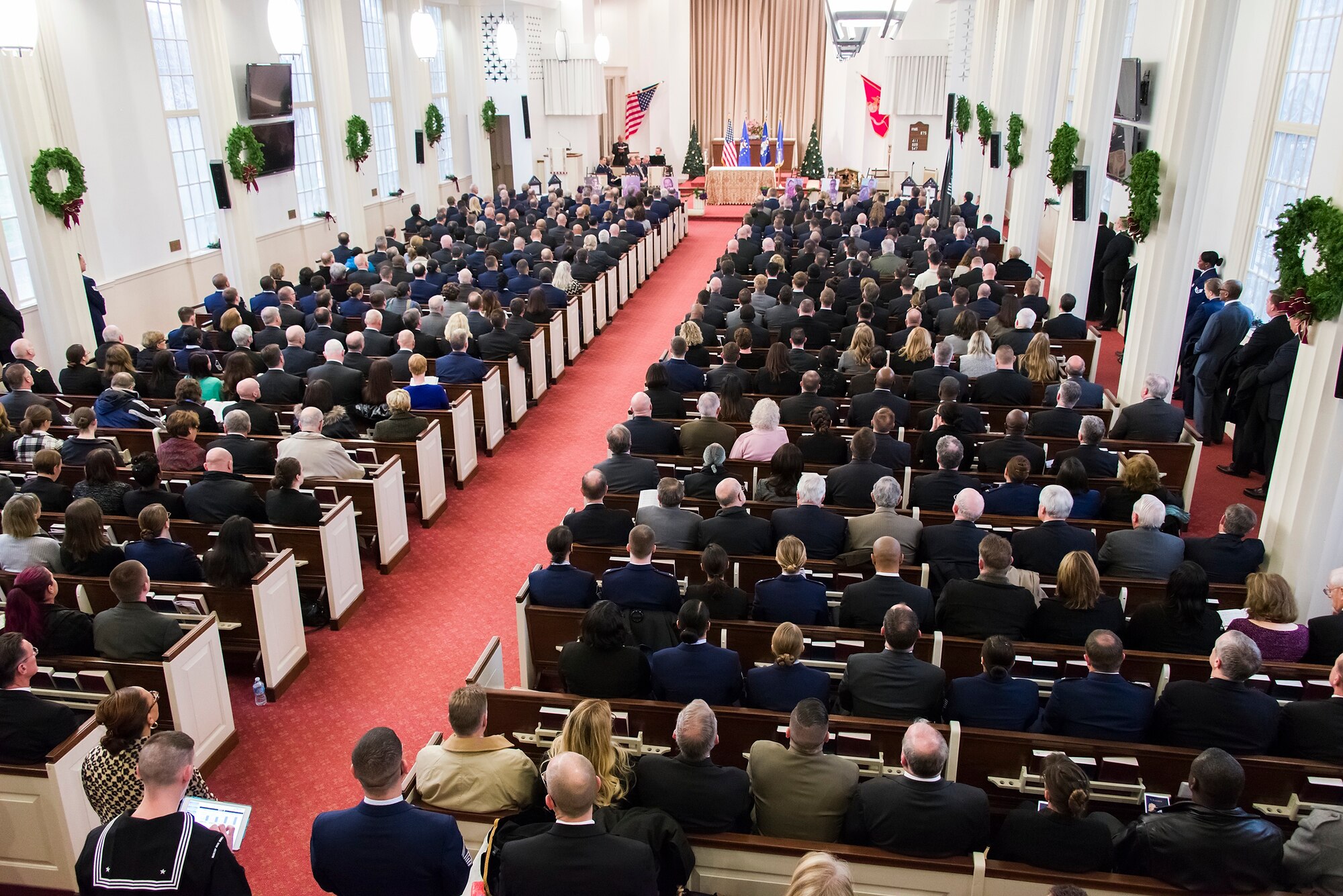 The four Air Force Office of Special Investigations special agents and two security forces defenders who were killed by a suicide bomber near Bagram Airfield, Afghanistan, Dec. 21, 2015, are remembered during a memorial service at the U.S. Marine Memorial Chapel in Quantico, Va., Jan. 7, 2016. (U.S. Air Force photo/Michael Hastings)