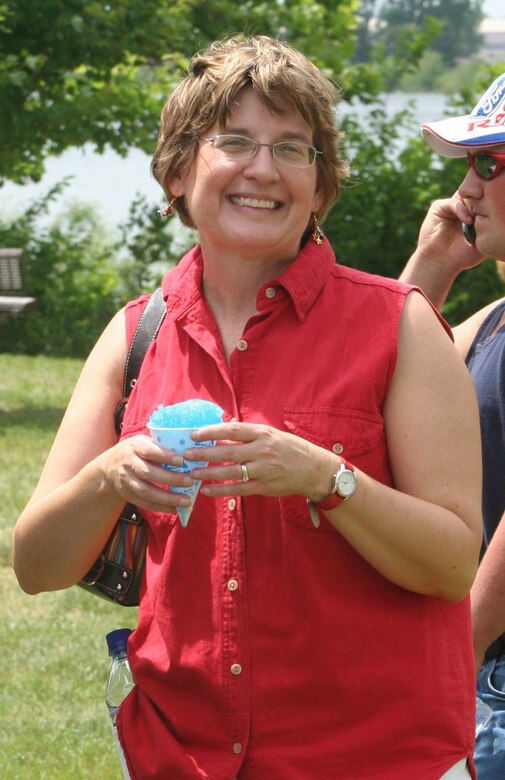 A snowcone on a hot summer day is the perfect treat for Maggie Oldham who took a break during one of many Omaha District Corps days she helped organize.