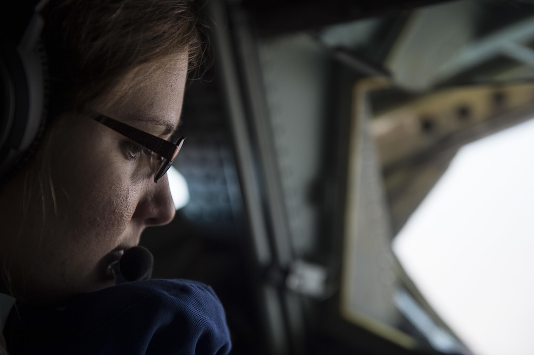 U.S. Air Force Senior Airman Rebekah McCormack flies aboard a KC-135 Stratotanker aircraft over Iraq, Jan. 6, 2016. McCormack is a boom operator assigned to the 340th Expeditionary Air Refueling Squadron, deployed from the 351st Air Refueling Squadron in RAF Mildenhall, England. U.S. Air Force photo by Staff Sgt. Corey Hook