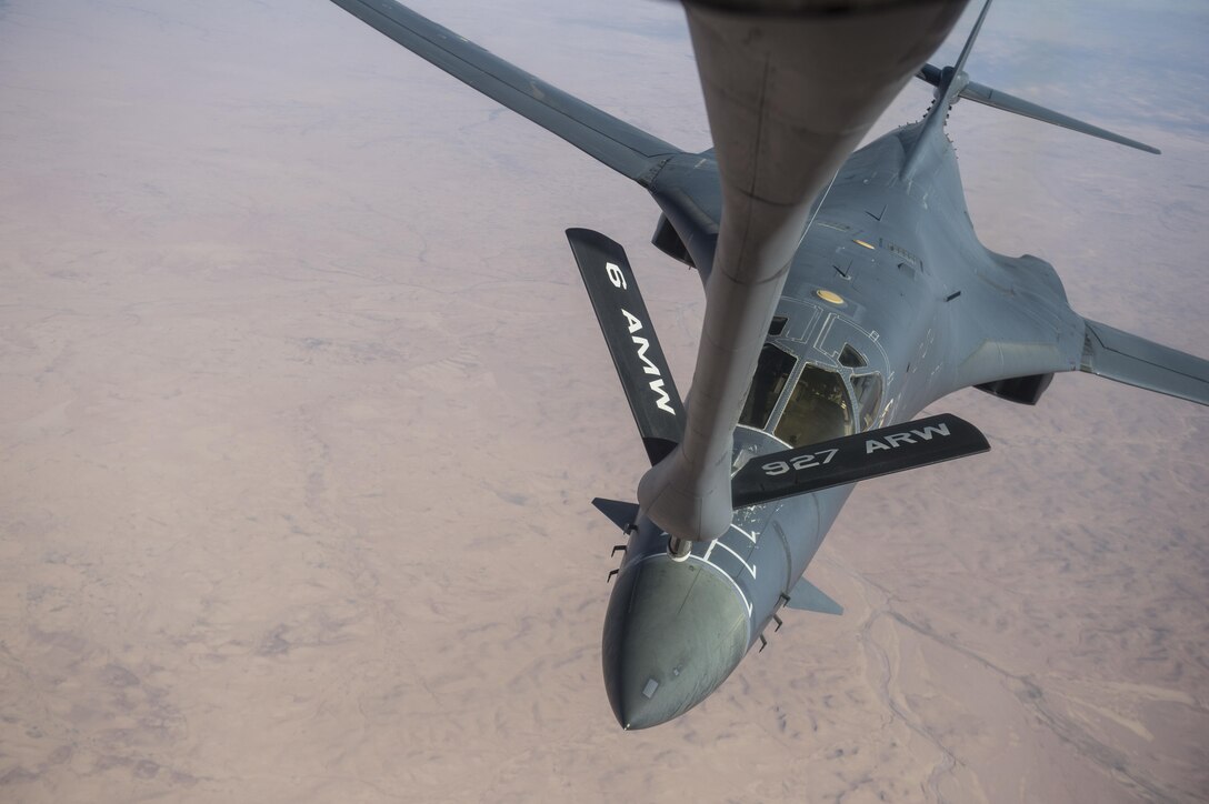 A U.S. Air Force KC-135 Stratotanker aircraft refuels a USAF B-1B Lancer over Iraq in support of Operation Inherent Resolve, Jan. 6, 2016. The Lancer aircrew is assigned to the 34th Expeditionary Bomb Squadron. U.S. Air Force photo by Staff Sgt. Corey Hook
