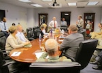 Medal of Honor recipient, retired Army Lt. Col. James “Mike” Sprayberry speaks with employees of the Defense POW/MIA Accounting Agency in Arlington, Virginia, Nov. 9.  Sprayberry served two tours in Vietnam and was awarded the Medal of Honor as a result of his heroic actions in April 1968 during Operation Delaware in the A Shau Valley, where he neutralized enemy forces and saved numerous Soldiers.