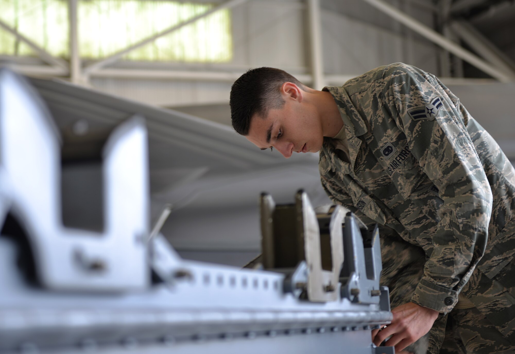 Airman 1st Class Jacob Robinson, 33rd Aircraft Maintenance Squadron weapons load crew member, ready’s a trailer for inspection at Eglin Air Force Base, Fla., Jan. 8, 2016. The load crew competition consists of three sections: a uniform inspection, written test and a munitions load inspection to test the Airmen’s carrier field knowledge. (U.S. Air Force Photo/Senior Airman Andrea Posey)