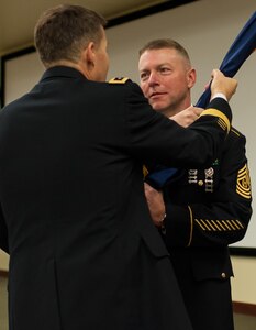 Command Sgt. Maj. James P. Wills, accepts the colors from Lt. Gen. Jeffrey W. Talley, chief U.S. Army Reserve and U.S. Army Reserve Command commanding general, during a change of responsibility ceremony at the U.S. Army Forces Command and U.S. Army Reserve Command headquarters, Jan. 8, 2016, at Fort Bragg, N.C. Wills takes over the U.S. Army Reserve's top enlisted position from Command Sgt. Maj. Luther Thomas Jr. who will be the senior enlisted adviser to the assistant secretary of defense for Manpower and Reserve Affairs. (U.S. Army photo by Timothy L. Hale/Released)