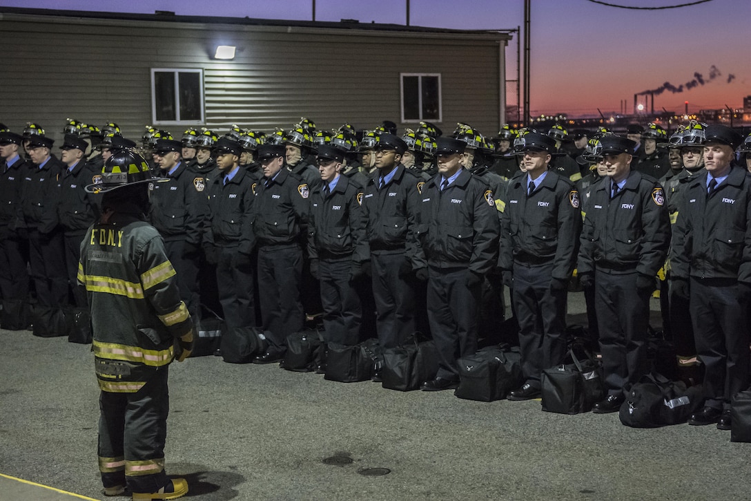 Probationary firefighters in their second week of training at the New York City Fire Academy on Russell Island in New York City, gather for inspection before beginning training for the day, Jan. 5, 2016. Drill sergeant leaders from the United States Army Drill Sergeant Academy on Fort Jackson, S.C., were at the Fire Academy Jan. 4-8, to observe training as part of a collaboration between the Fire Department of New York and the Center for Initial Military Training providing lessons learned and offering alternate training methods for new recruits. (U.S. Army photo by Sgt. 1st Class Brian Hamilton)