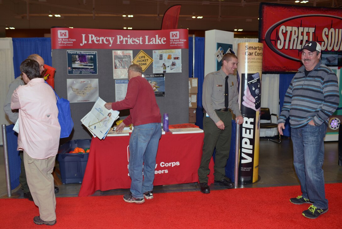 U.S. Army Corps of Engineers Nashville District Park Ranger Brent Sewell talks with long time Old Hickory Lake Resident Chip Buckner at the 30th annual Nashville Boat & Sportshow on Thursday, Jan. 7, 2016 in Music City Center.