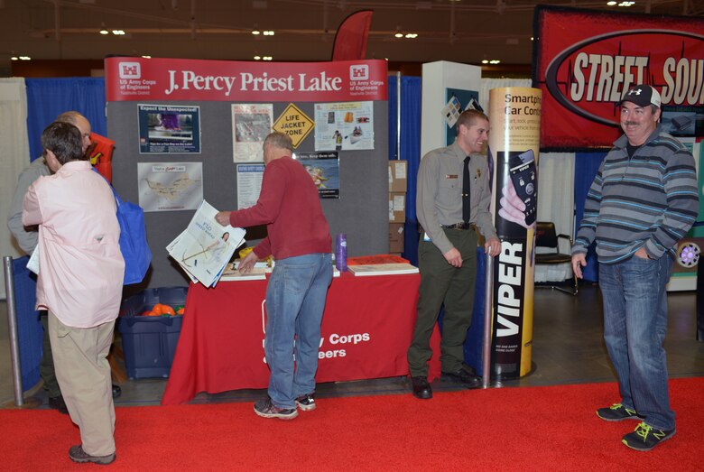 U.S. Army Corps of Engineers Nashville District Park Ranger Brent Sewell talks with long time Old Hickory Lake Resident Chip Buckner at the 30th annual Nashville Boat & Sportshow on Thursday, Jan. 7, 2016 in Music City Center.