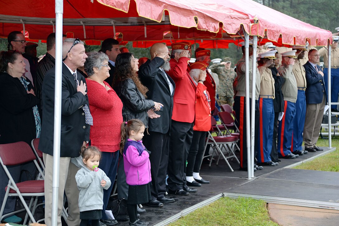 Family members, friends and Marines gather at Covella Pond for a rededication ceremony held in honor of late Gunnery Sgt. Joseph Covella, Jan. 8. The base pond was officially named “Covella Pond” and marked with a bronze plaque mounted on a marble monument, Sept. 23, 1969. Covella was mortally wounded while serving as an advisor to the Armed Forces of the Republic of Vietnam, Jan. 3, 1966.