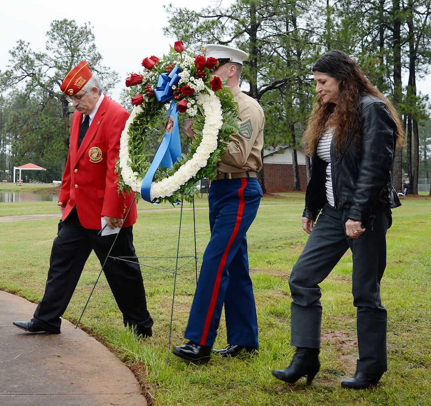 Members of the Covella family lay a wreath during a rededication ceremony for Covella Pond in honor of late Gunnery Sgt. Joseph Covella, Jan. 8. The base pond was officially named “Covella Pond” and marked with a bronze plaque mounted on a marble monument, Sept. 23, 1969. Covella was mortally wounded while serving as an advisor to the Armed Forces of the Republic of Vietnam, Jan. 3, 1966.