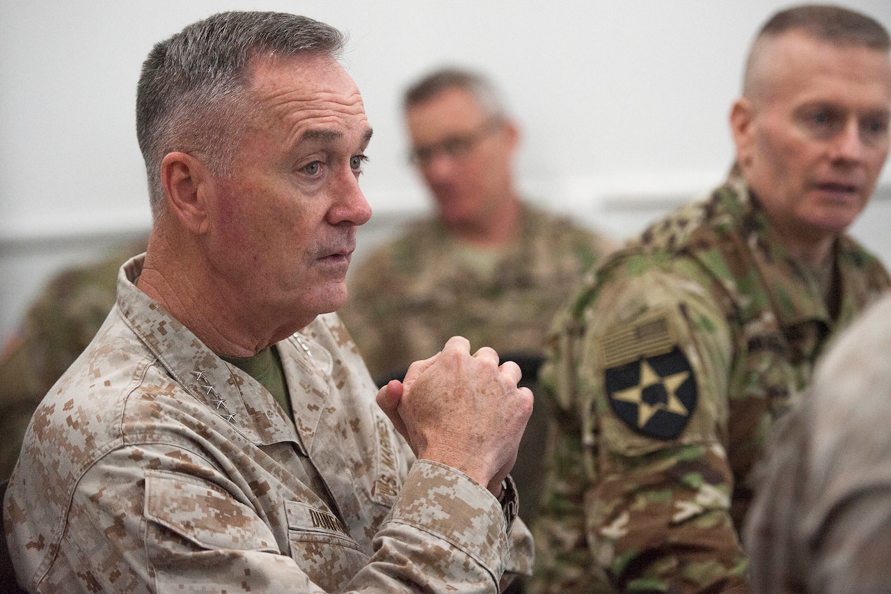 U.S. Marine Corps Gen. Joseph F. Dunford Jr., center left, chairman of the Joint Chiefs of Staff, and Iraq Counter Terrorism Service Director Gen. Talib Shegati al-Kenan, listen to a brief about the Iraqi Army's recent efforts in Ramadi at the Combined Joint Operations Center in Baghdad, Jan. 8, 2016. Dunford met with U.S. and coalition leaders in Iraq to assess the progress against the Islamic State. (DoD Photo by Navy Petty Officer 2nd Class Dominique A. Pineiro)