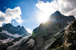 The sun peaks over the Middle Teton on Sept. 20, 2014, at Grand Teton National Park, Wyoming. The Tetons are believed to have been first recorded by French speaking Iroquois or French trappers living in the area. (U.S. Air Force photo by Airman 1st Class Connor J. Marth/RELEASED)