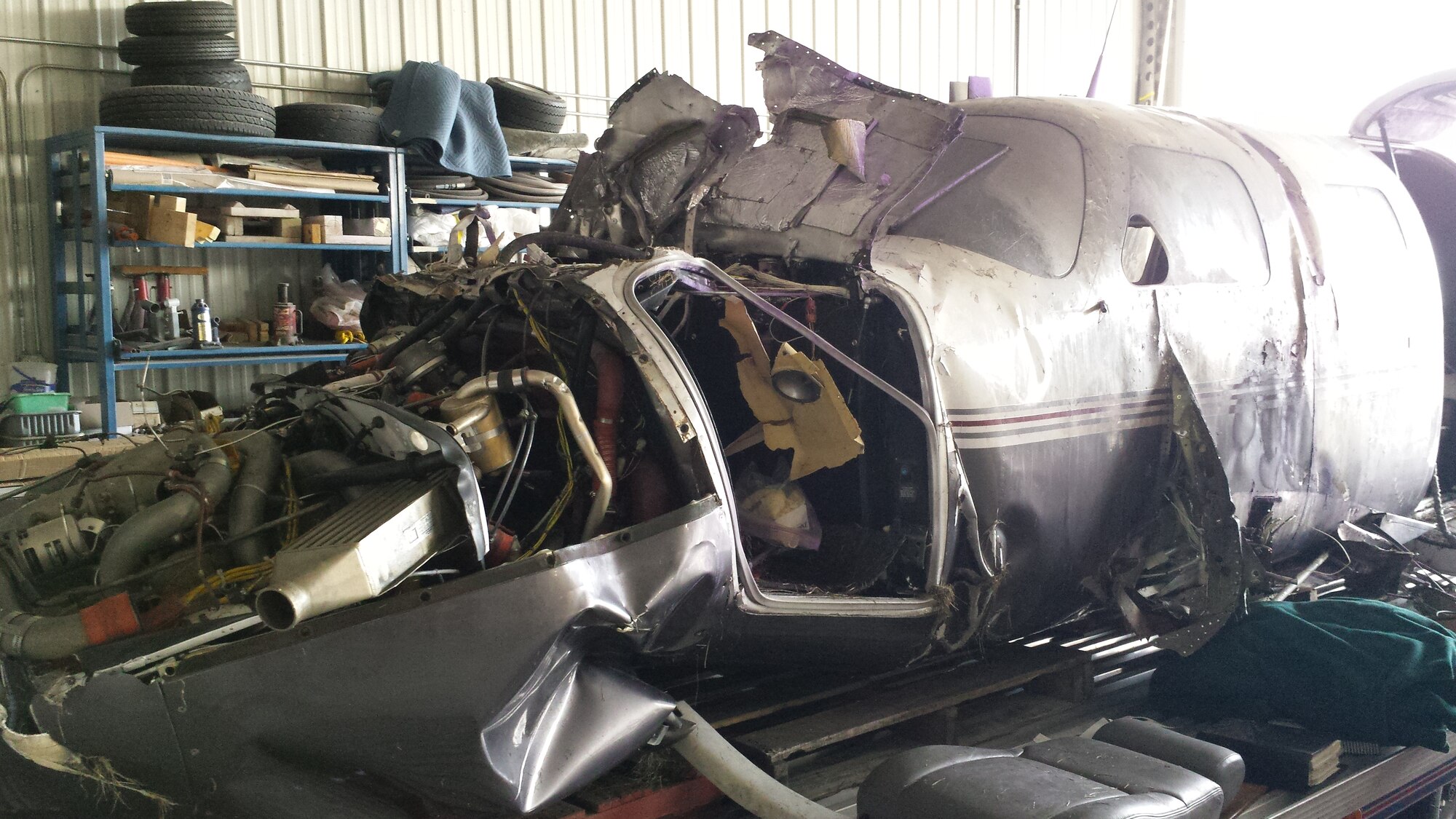 Plane wreckage following an aircraft incident during the 2015 Experimental Aircraft Association's AirVenture Oshkosh fly-in convention in Oshkosh, Wis., July 22, 2015. Lt. Col. Ben West, 115th Fighter Wing pilot, and Maj. Michael Bracki, 126th Air Refueling Wing pilot, were both on scene helping to get passengers to safety following the incident. (Photo courtesy of Lt. Col. Ben West)