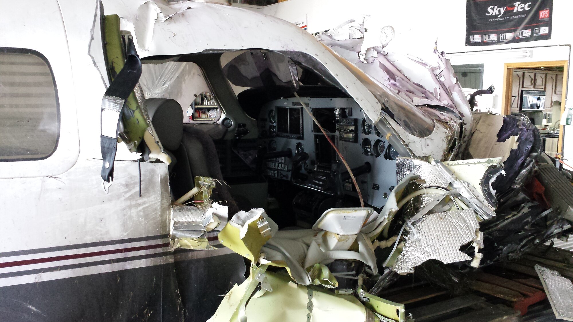 Plane wreckage following an aircraft incident during the 2015 Experimental Aircraft Association's AirVenture Oshkosh fly-in convention in Oshkosh, Wis., July 22, 2015. Lt. Col. Ben West, 115th Fighter Wing pilot, and Maj. Michael Bracki, 126th Air Refueling Wing pilot, were both on scene helping to get passengers to safety following the incident. (Photo courtesy of Lt. Col. Ben West)
