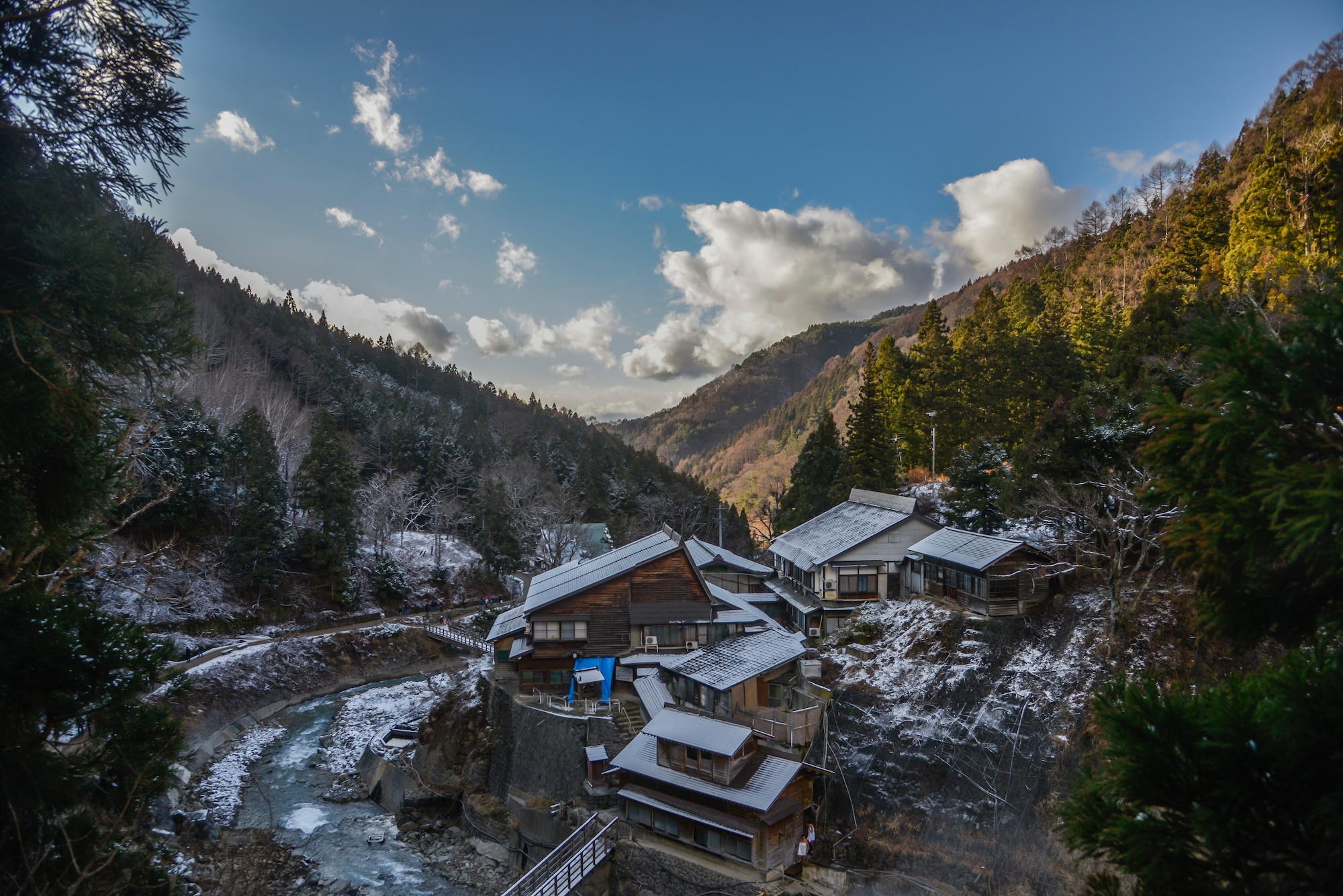 People walk towards the Wild Snow Monkey Park in Jigokudani Yaen-koen, Nagano, Japan, Dec. 26, 2015. The park was established in 1964 and has provided people with the opportunity to see the monkeys in their natural habitat. (U.S. Air Force photo by Senior Airman David Owsianka/Released)