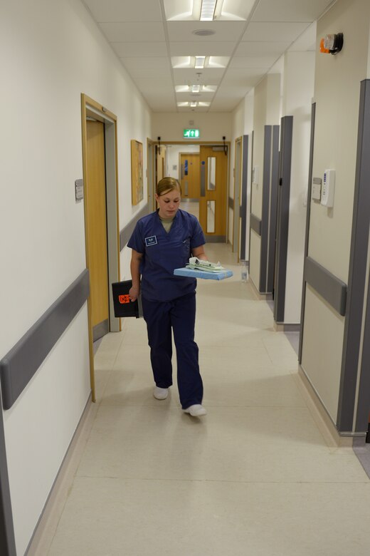 Senior Airman Alicia Rosdahl, a dental technician with the 423rd Medical Squadron, retrieves sterilized tools to get ready for her next patient, at the RAF Alconbury, United Kingdom, Dental Clinic, Jan. 6, 2015. Prep work, prior to a procedure, ensures appointments run smoothly and safely while also making sure all equipment is present and sanitary. (U.S. Air Force photo by Airman 1st Class Zachary Bumpus/Released)