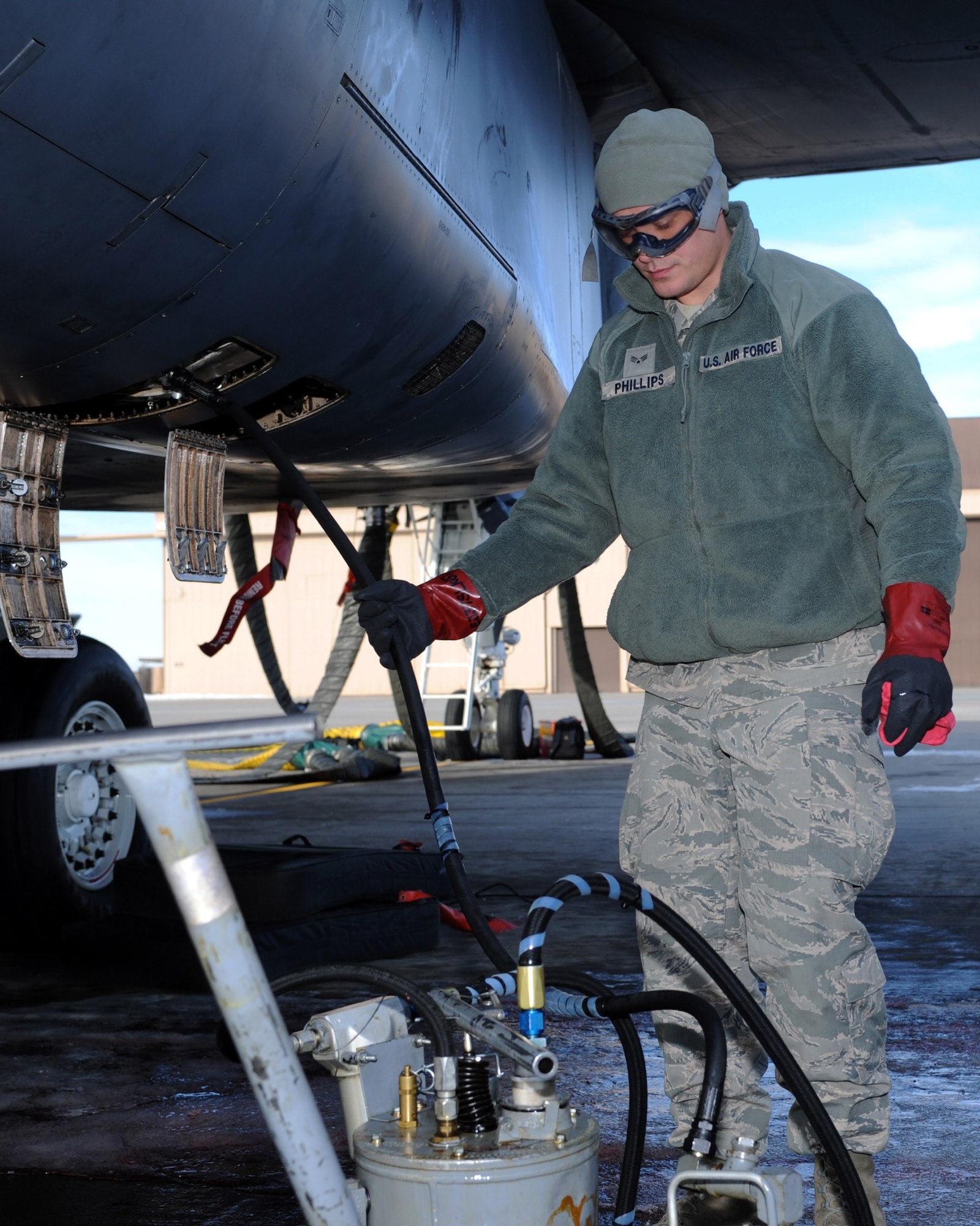 Senior Airman Anthony Phillips, 28th Aircraft Maintenance Squadron, 34 Aircraft Maintenance Unit, instillation flight control technician, uses an accessory drive gearbox to turn the pumps of a B-1 bomber during routine maintenance at Ellsworth Air Force Base, S.D., Jan. 6, 2016. The accessory drive gearbox simulates the B-1 being active as a means to accurately replicate airborne issues. (U.S. Air Force photo by Airman 1st Class Denise M. Nevins/Released)