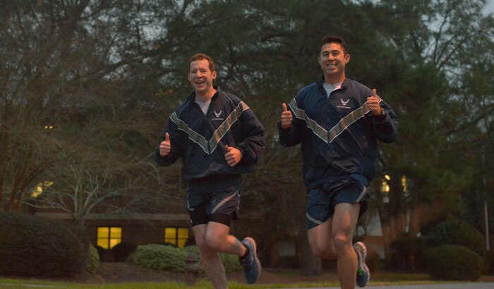 (From left to right) Captains John Kronenwetter, 15th Airlift Squadron mission director and Scott Levin, 15 AS assistant flight commander, run in a 5K on Joint Base Charleston – Air Base, S.C., to celebrate the 437th Airlift Wing’s 50th anniversary being here on Jan. 8, 2016. Before the 437th AW got to JB Charleston in 1966, it was once a traditional reserve wing located at the Chicago O’Hare International Airport, IL. (U.S. Air Force photo/Airman 1st Class Thomas T. Charlton)