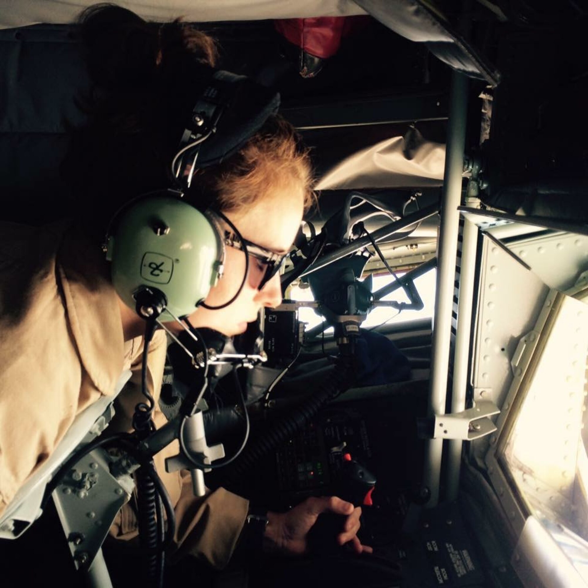 Senior Airman Erica Mann, 92nd Air Refueling Squadron boom operator, controls the boom of a KC-135 Stratotanker, while in flight, Oct. 2015. Along with being a boom operator, Mann is also the squadron historian, Defense Travel System approving official, and assists with individuals' Government Travel Cards. Her leadership selected her as one of Fairchild’s Finest, a weekly recognition program that highlights top-performing Airmen. (Courtesy Photo)