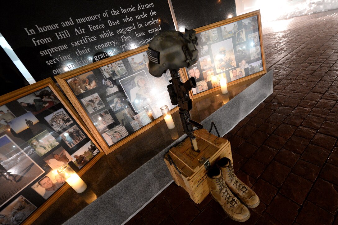 A memorial for three fallen Team Hill Airmen who died in 2007 rests in Hill Air Force Base’s Memorial Park Jan. 7. Tech. Sgt. Timothy Weiner, Senior Airman Daniel Miller, and Senior Airman Elizabeth Loncki -- all deployed to Iraq from the 775th Civil Engineer Squadron at Hill -- were investigating a vehicle-borne improvised explosive device near Al Mahmudiyah, Iraq, when the device detonated, killing the three Airmen and a U.S. Army Soldier, and injuring another Airman on Jan. 7, 2007. Approximately 60 attended the annual remembrance ceremony. (U.S. Air Force photo by Paul Holcomb)