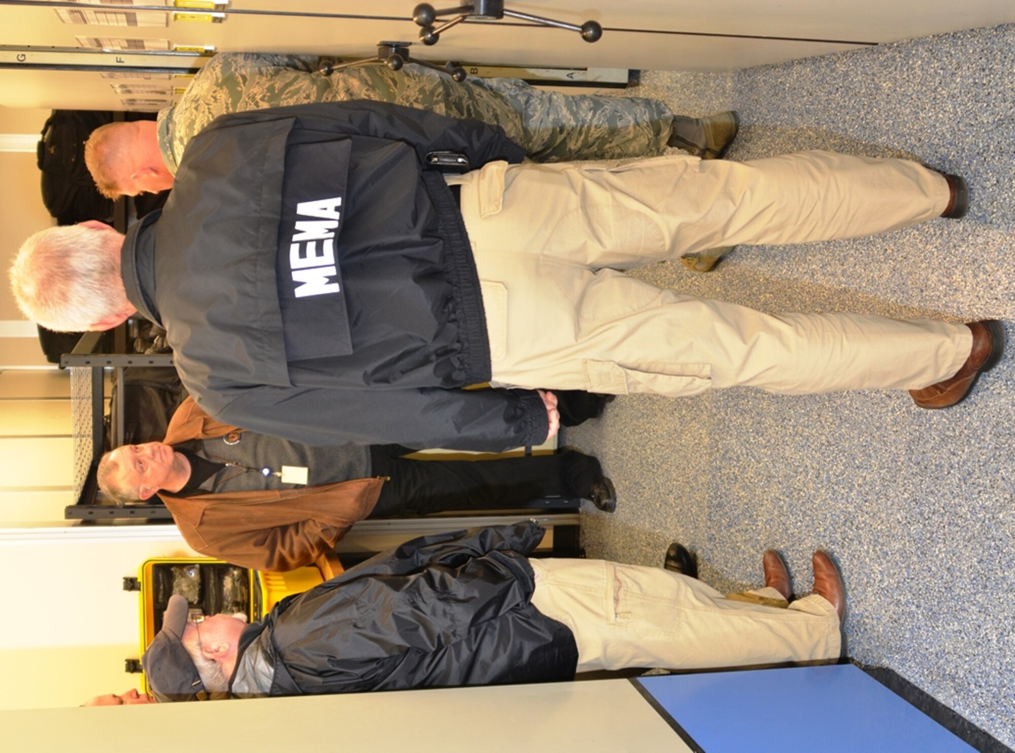 Maryland Emergency Management Agency (MEMA) Regional Liaison Officers (RLO) listen to Senior Master Sgt. Matt Crabill, 175th Emergency Management Superintendent, describe the Maryland Air National Guard’s Domestic Operations (DOMOPS) support capabilities in the event of a natural disaster or other emergency. The RLOs were at Warfield Air National Guard Base in Baltimore December 5th. (U.S. Air National Guard photo by Tech. Sgt. David Speicher/RELEASED)