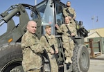 From left, Tech. Sgt. Chad Huggins, Staff Sgt. Tobi Wagner, Master Sgt. Matthew Longshaw and Airman 1st Class John Michael Aradanas, 455th Expeditionary Logistics Readiness Squadron, were at Hamid Karzai International Airport in Kabul when a vehicle-borne improvised explosive device detonated. (U.S. Air Force photo by Capt. Bryan Bouchard)