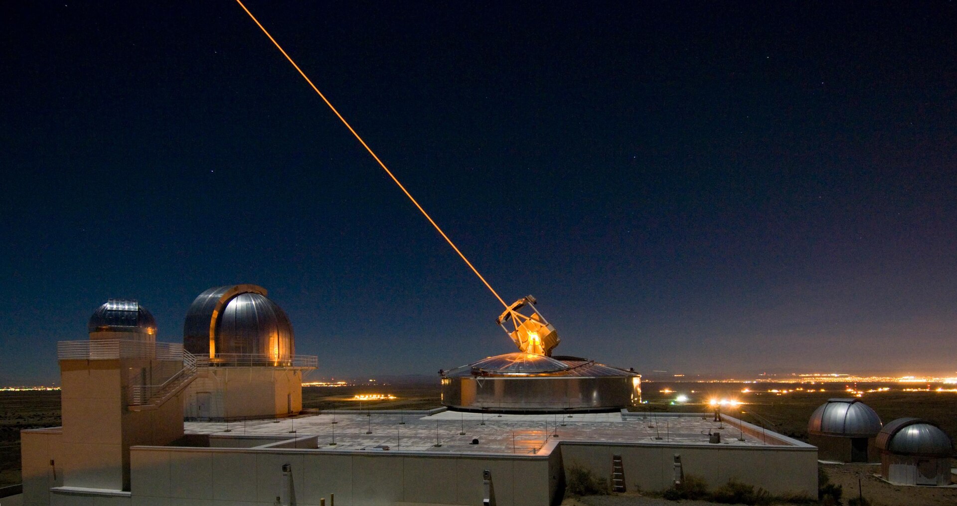 The Sodium Guidestar at the Air Force Research Laboratory Directed Energy Directorate's Starfire Optical Range. Researchers with AFRL use the Guidestar laser for real-time, high-fidelity tracking and imaging of satellites too faint for conventional adaptive optical imaging systems. The range’s world-class adaptive optics telescope is the second largest telescope in the Defense Department. (Courtesy photo)