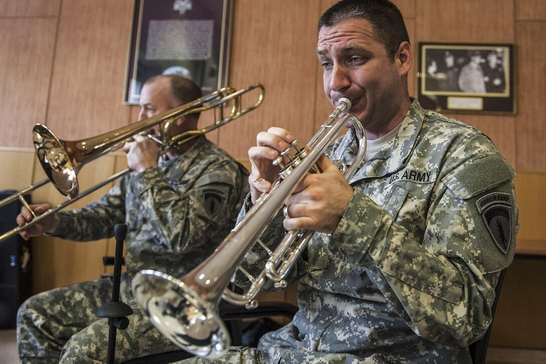 U.S. Army Europe Band and Chorus members perform during a ceremony at Landsthul Regional Medical Center in Germany, Jan. 7, 2016. U.S. Air Force photo by Tech Sgt. Brian Kimball