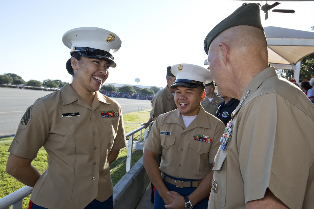Commandant of the Marine Corps, Gen. Robert B. Neller, speaks to Marine recruiters before a graduation ceremony at Marine Corps Recruit Depot Parris Island, S.C., Oct. 16, 2015. Neller was the parade reviewing official for the ceremony. (U.S. Marine Corps photo by Sgt. Gabriela Garcia/Released)