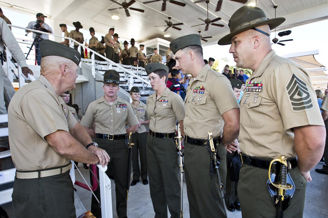 Commandant of the Marine Corps, Gen. Robert B. Neller, speaks to Marines after a graduation ceremony at Marine Corps Recruit Depot Parris Island, S.C., Oct. 16, 2015. Neller was the parade reviewing official for the ceremony. (U.S. Marine Corps photo by Sgt. Gabriela Garcia/Released)