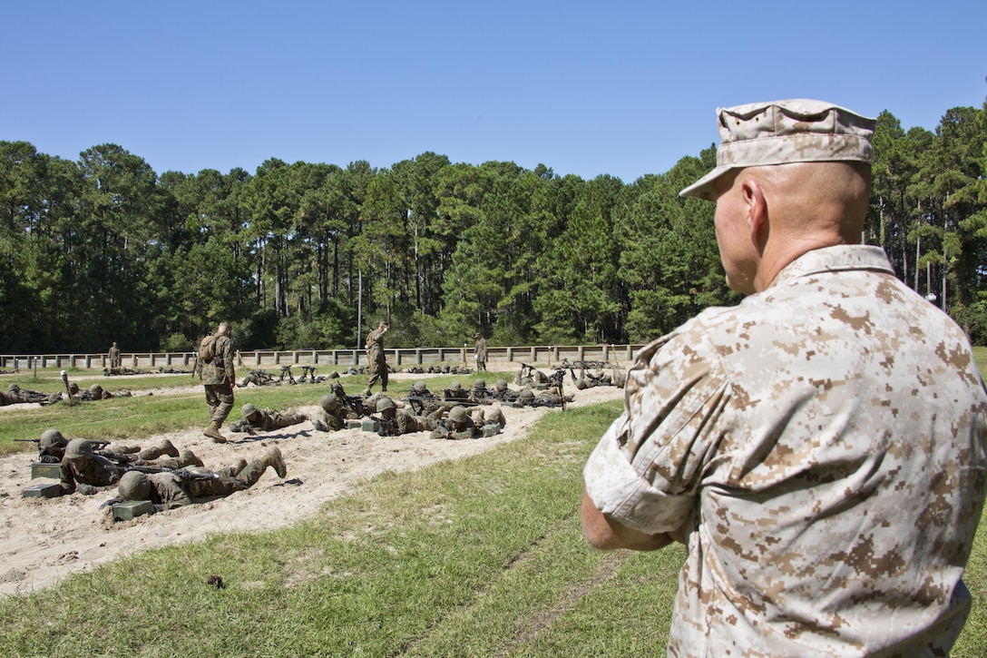 Commandant of the Marine Corps, Gen. Robert B. Neller, observes recruits executing a portion of the crucible at Marine Corps Recruit Depot Parris Island, S.C., Oct. 16, 2015. Neller watched recruits go through one of the toughest parts of their recruit training. (U.S. Marine Corps photo by Sgt. Gabriela Garcia/Released)